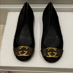 Gucci Black Flats with Gold Logo Accent